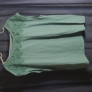 Women's teal cotton shirt with braided neckline
